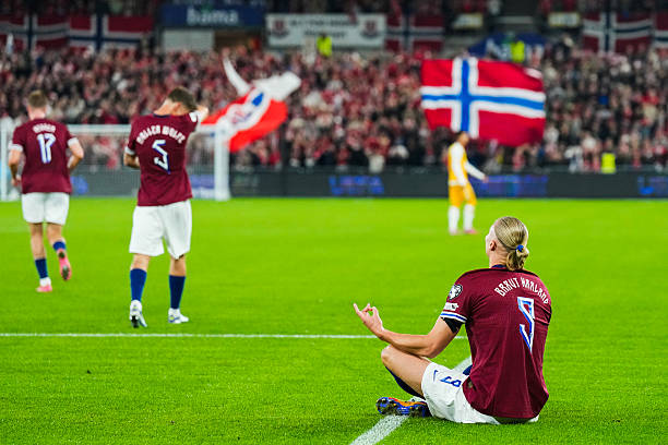 Erling Haaland celebrates scoring a goal for Norway.