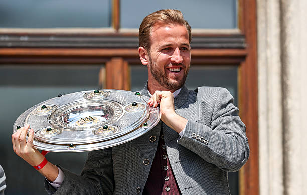 Harry Kane with Bundesliga trophy